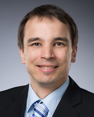 Dr. Simon Rihs