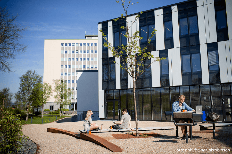 students at NHH outside the building