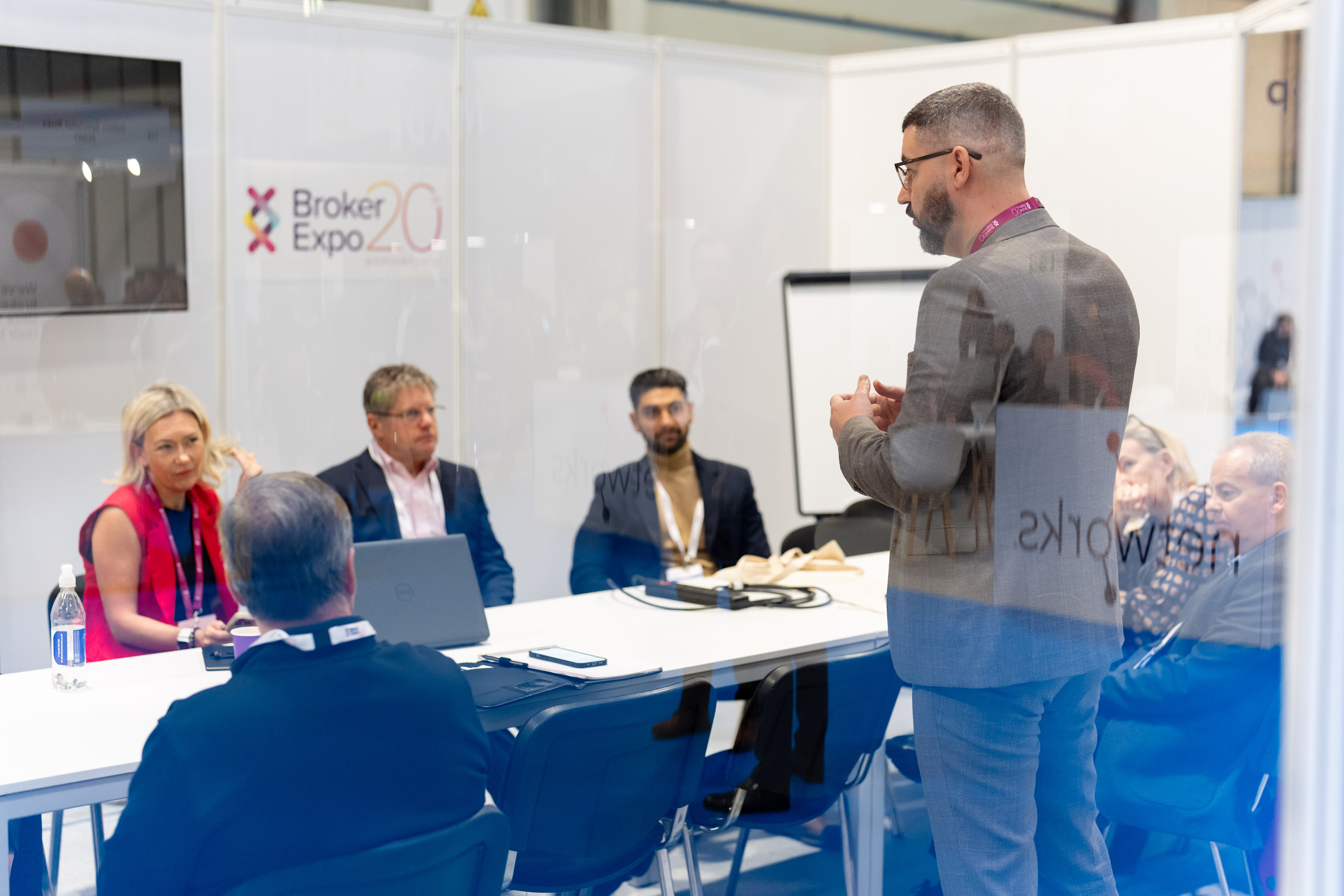 Brokers attending drop-in clinic