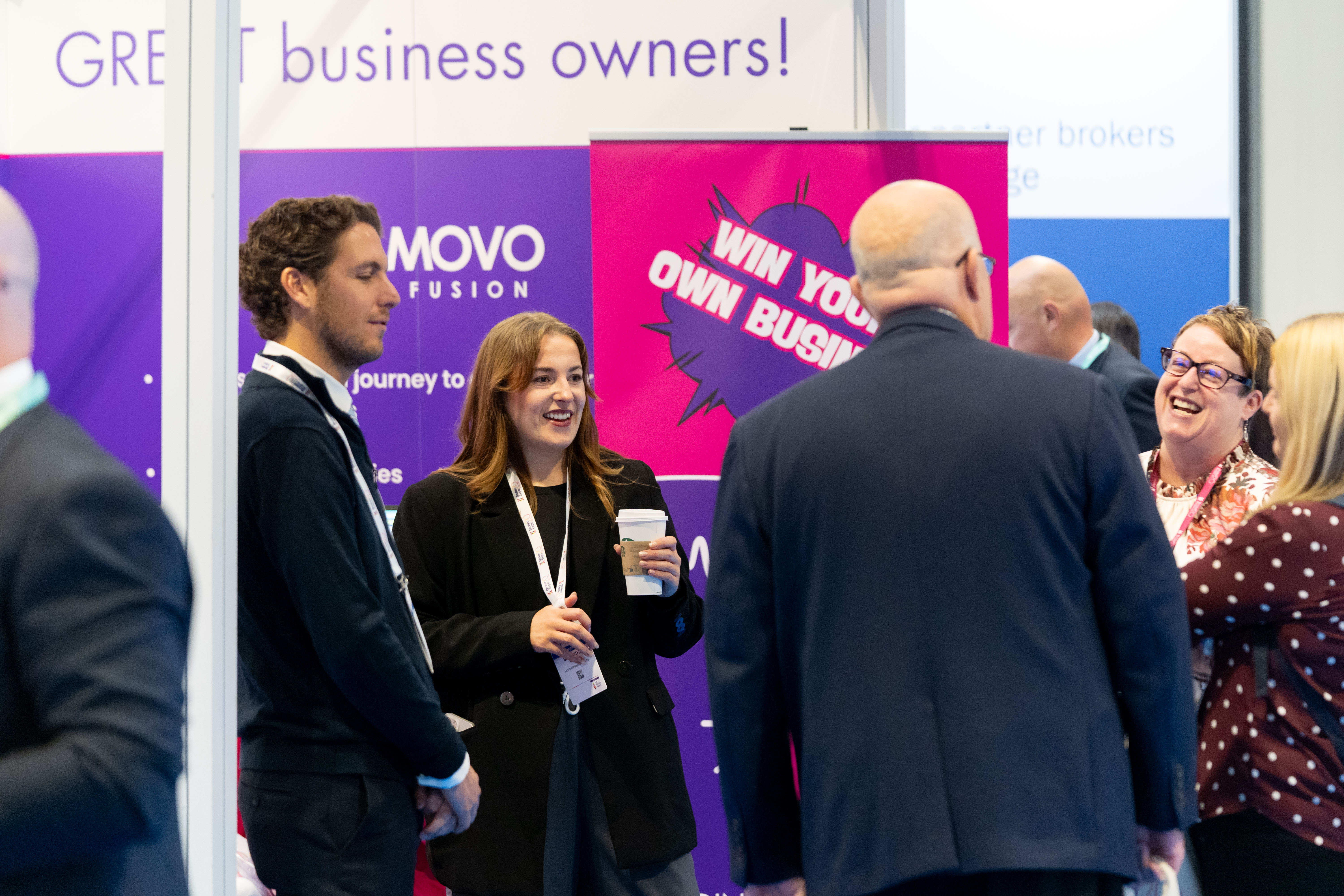 People networking at Broker Expo